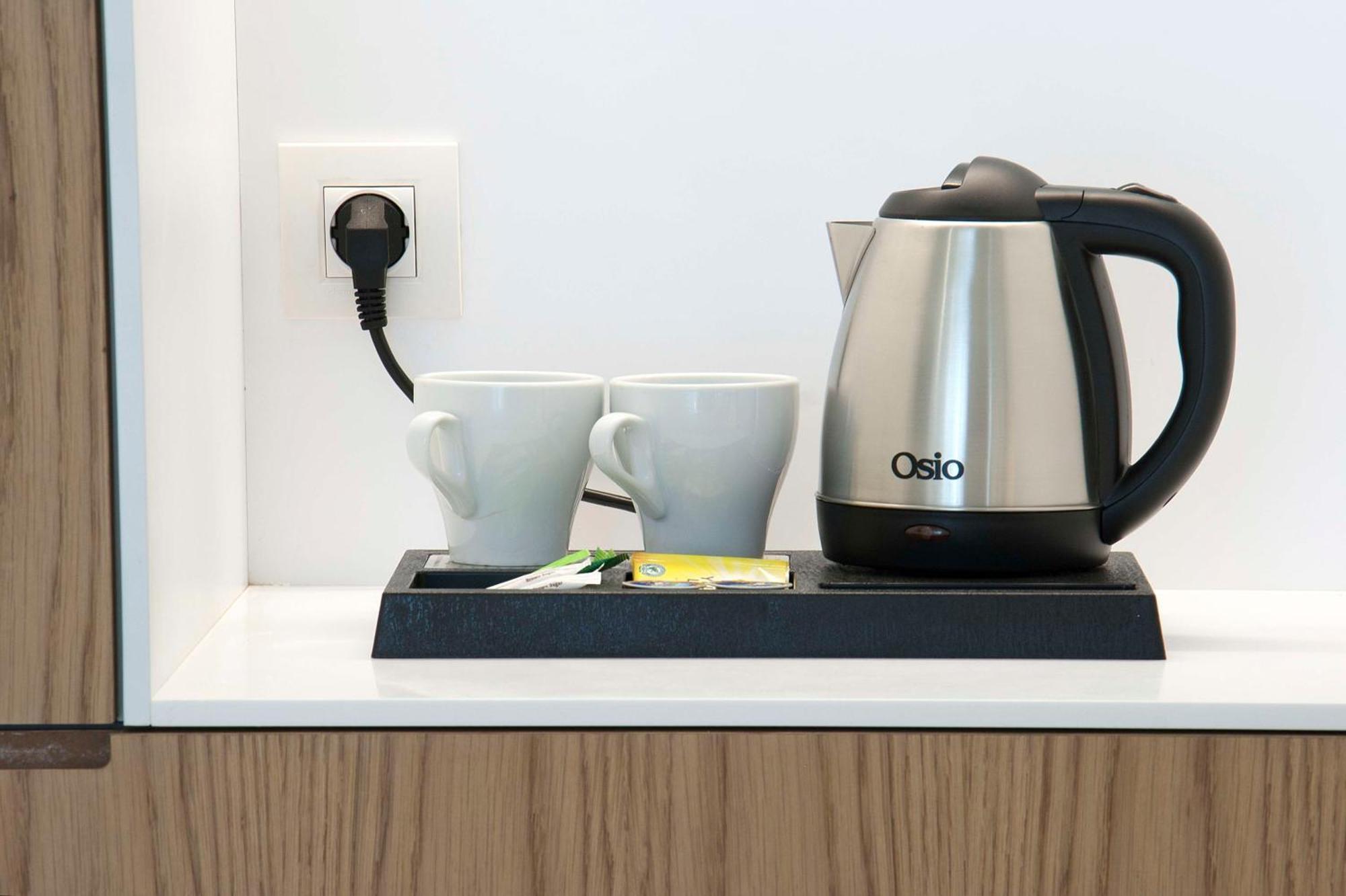 Radisson Blu Towers Kaushambi Delhi Ncr Hotel Ghaziabad Ngoại thất bức ảnh A kettle